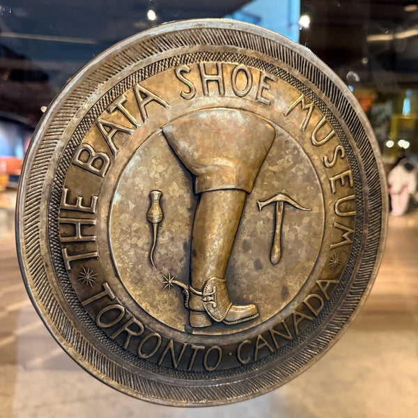 Bronze door handle at 'The Bata Shoe Museum Toronto Canada'.