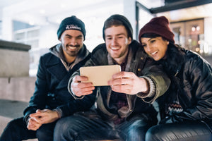 Friends taking a selfie during a Mystery Day Trip.